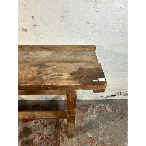 99 - A vintage pine work bench - approx. 87cm high x 137cm wide x 47cm deep