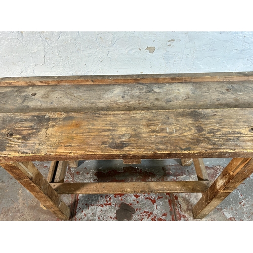 99 - A vintage pine work bench - approx. 87cm high x 137cm wide x 47cm deep