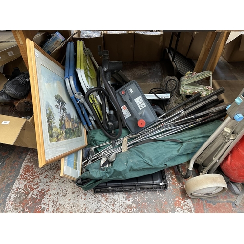 1191 - A large collection of house clearance items to include golf clubs, ceramics, Friends VHSs, oil paint... 