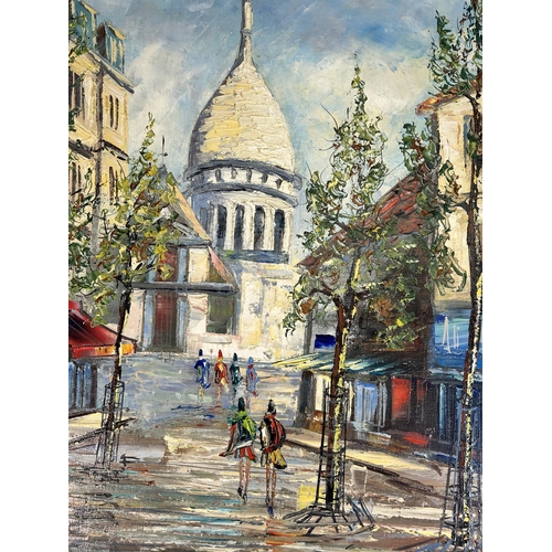 260 - A gilt framed oil on canvas of a Parisian scene - approx. 51cm high x 60cm wide