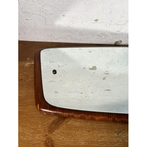 276 - A mid 20th century teak framed asymmetrical wall mirror - approx. 93cm high x 32cm wide