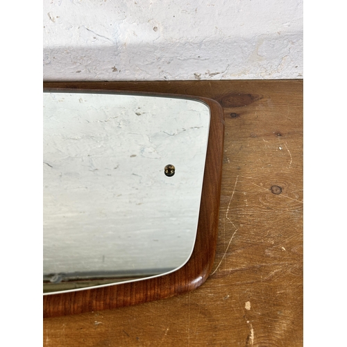 276 - A mid 20th century teak framed asymmetrical wall mirror - approx. 93cm high x 32cm wide