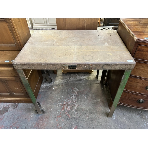 133 - A 1950s Brixey Engineering Ltd. green painted steel industrial work table on casters - approx. 83cm ... 