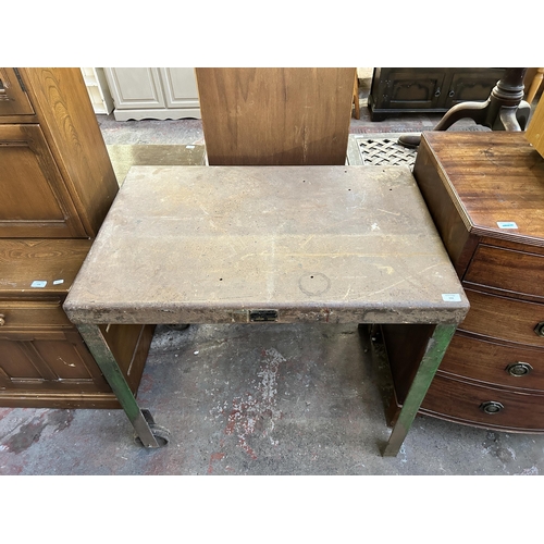 133 - A 1950s Brixey Engineering Ltd. green painted steel industrial work table on casters - approx. 83cm ... 