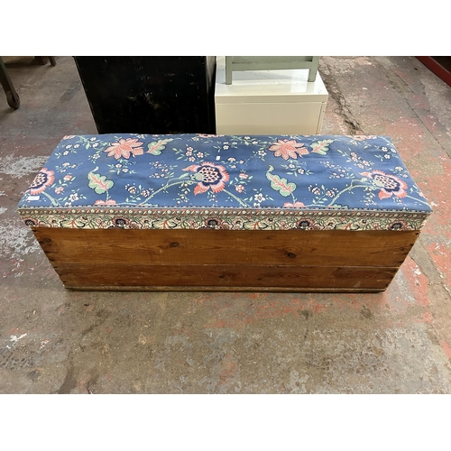 135 - A pine and fabric upholstered blanket box - approx. 49cm high x 138cm wide x 48cm deep