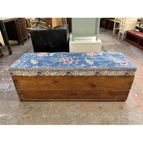 135 - A pine and fabric upholstered blanket box - approx. 49cm high x 138cm wide x 48cm deep