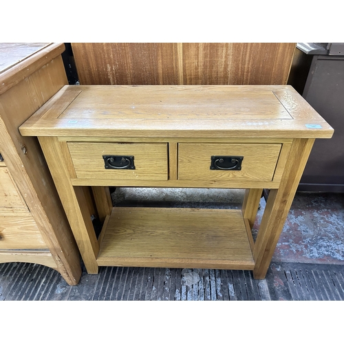 145 - A modern solid oak console table - approx. 76cm high x 85cm wide x 35cm deep