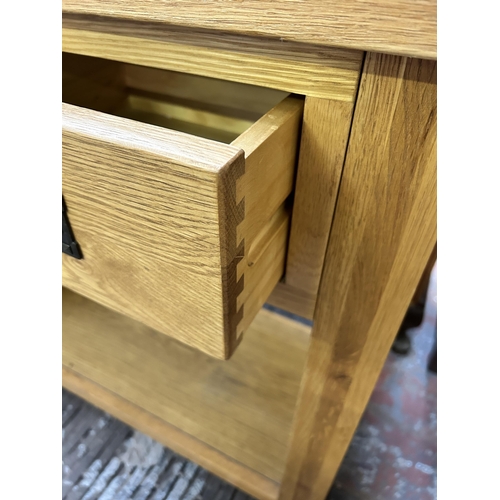 145 - A modern solid oak console table - approx. 76cm high x 85cm wide x 35cm deep