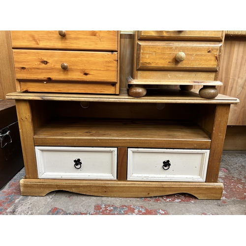 161 - Three pieces of pine furniture, two bedside chests of drawers and one TV stand