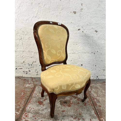 162 - A Victorian walnut and fabric upholstered nursing chair