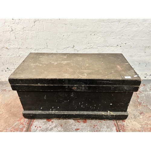 167 - A late 19th/early 20th century ebonized pine carpenter's tool box - approx. 45cm high x 87cm wide x ... 