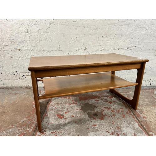 181 - A mid 20th century teak rectangular two tier coffee table - approx. 43cm high x 42cm wide x 81cm lon... 