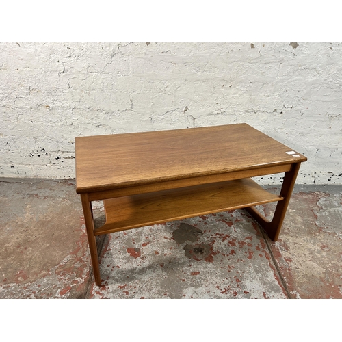 181 - A mid 20th century teak rectangular two tier coffee table - approx. 43cm high x 42cm wide x 81cm lon... 