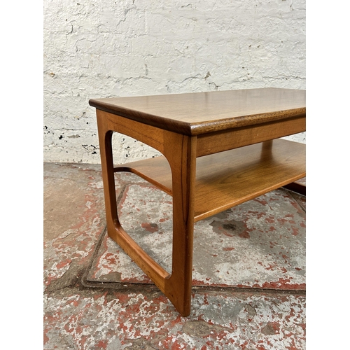 181 - A mid 20th century teak rectangular two tier coffee table - approx. 43cm high x 42cm wide x 81cm lon... 