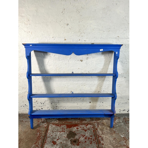 188A - A blue painted pine three tier plate rack - approx. 127cm high x 128cm wide x 17cm deep