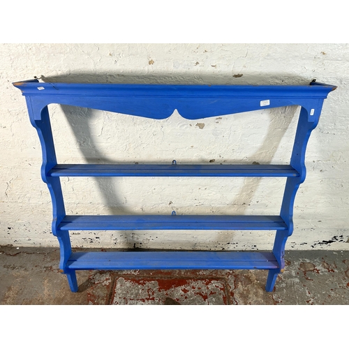 188A - A blue painted pine three tier plate rack - approx. 127cm high x 128cm wide x 17cm deep