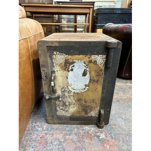 197 - A Victorian cast iron safe - approx. 62cm high x 46cm wide x 50cm deep