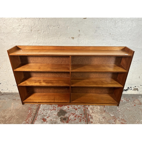 218 - A mid 20th century teak bookcase - approx. 90cm high x 152cm wide x 22cm deep