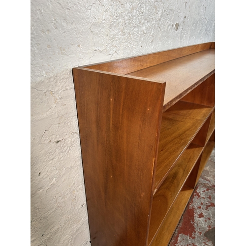 219 - A mid 20th century teak bookcase - approx. 90cm high x 152cm wide x 22cm deep