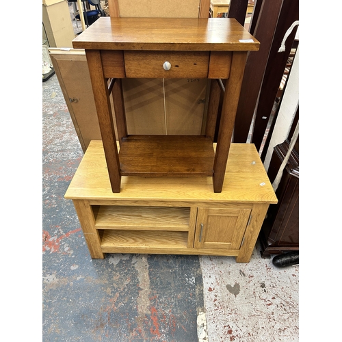 221 - Two pieces of modern furniture, one hardwood side table and one oak TV stand - approx. 51cm high x 9... 