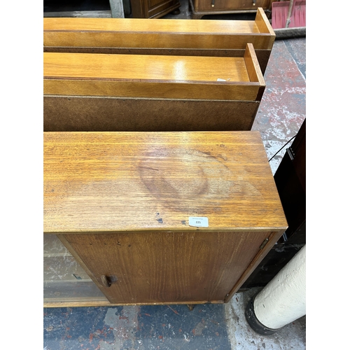 225 - A mid 20th century Herbert E. Gibbs teak bookcase with two glass sliding doors