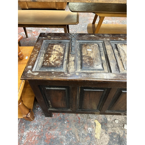 228 - An 18th century style oak panelled blanket box - approx. 53cm high x 91cm wide x 42cm deep