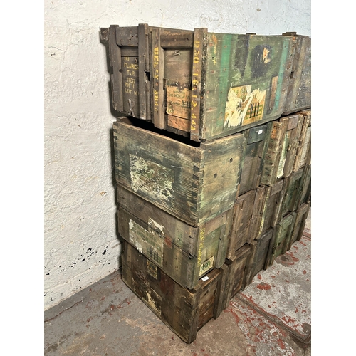 230 - A collection of vintage pine ammunition crates together with an early 20th century wooden tool box