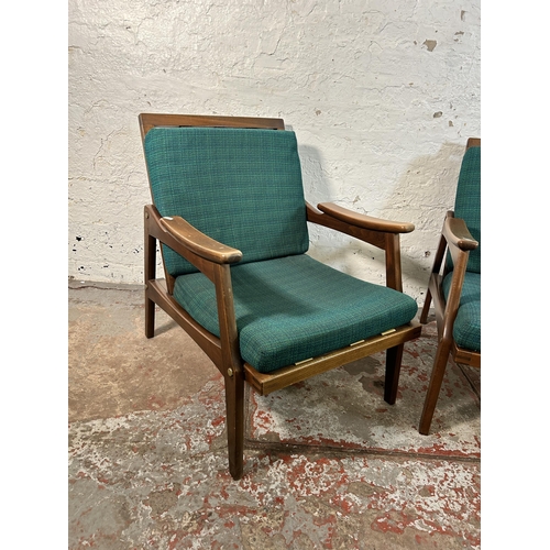 233 - A pair of mid 20th century beech and green fabric upholstered armchairs