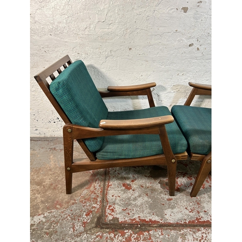 233 - A pair of mid 20th century beech and green fabric upholstered armchairs