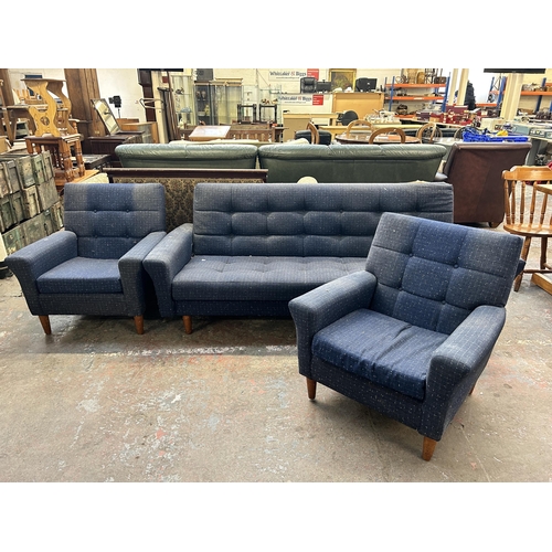 235 - A mid 20th century blue fabric upholstered three piece lounge suite