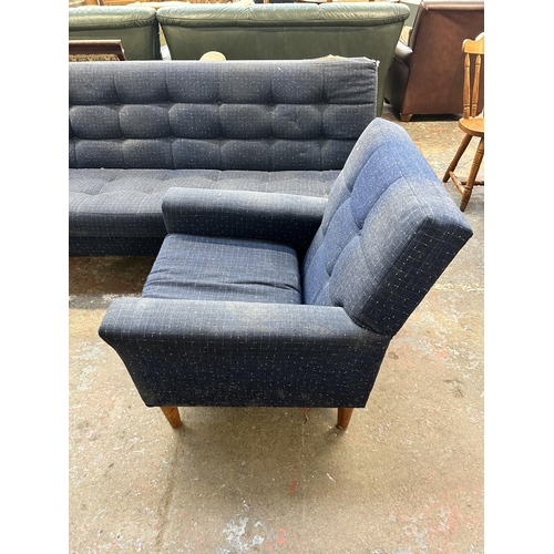 235 - A mid 20th century blue fabric upholstered three piece lounge suite