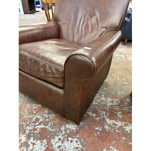 238 - A Marks & Spencer brown leather armchair