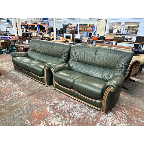 239 - A green leather and beech two piece lounge suite comprising three seater sofa and two seater sofa