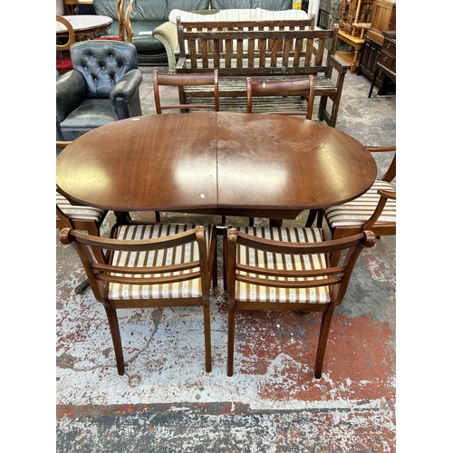 247 - A Regency style mahogany extending dining table and six chairs