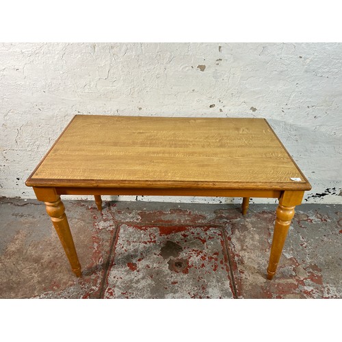 186 - A modern oak effect and beech rectangular kitchen table - approx. 74cm high x 64cm wide x 112cm long