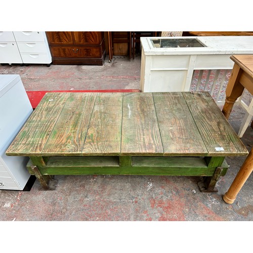 203 - A reclaimed pine and cast iron rectangular coffee table - approx. 46cm high x 61cm wide x 120cm long