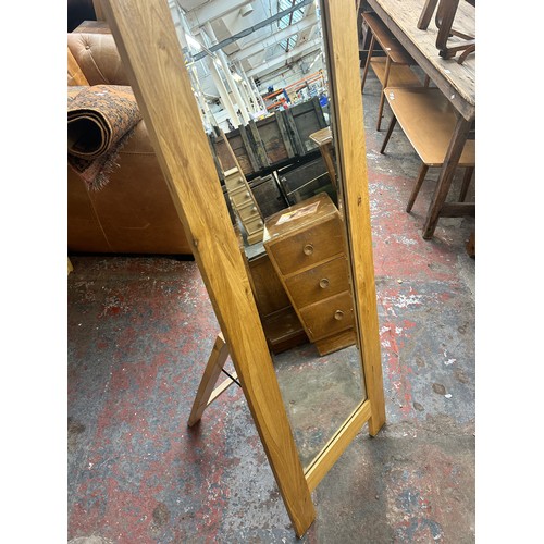 206 - A modern oak framed bevelled edge cheval mirror - approx. 144cm high x 48cm wide