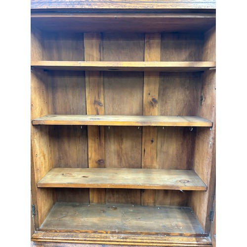 217 - An Arts and Crafts inlaid oak bureau bookcase with two stained and leaded glass doors - approx. 200c... 