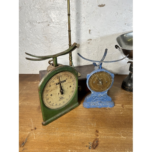 624 - Four antique and later weighing scales to include brass and oak precision, W & T Avery Ltd cast iron... 