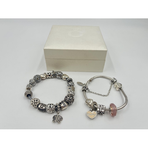 2008 - Two Pandora .925 silver charm bracelets with box - approx. gross weight 96g