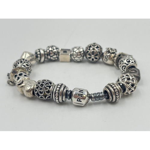 2008 - Two Pandora .925 silver charm bracelets with box - approx. gross weight 96g