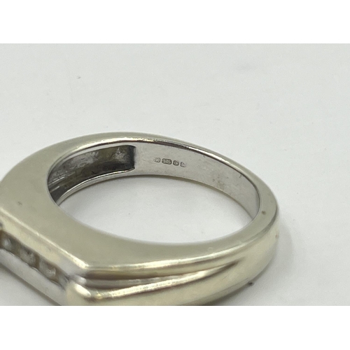 2009 - A hallmarked Birmingham 9ct white gold diamond four stone ring, size T - approx. gross weight 9.5g