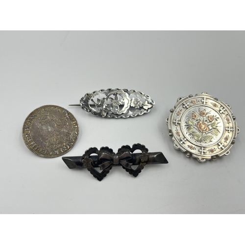 2017 - Four antique silver brooches, three hallmarked sterling silver and one .925 1562 sixpence - approx. ... 