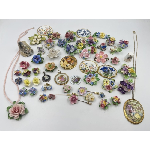 2018 - A collection of ceramic brooches and pendants to include Wedgwood black Jasperware, Aynsley Orchard ... 