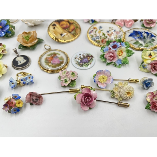 2018 - A collection of ceramic brooches and pendants to include Wedgwood black Jasperware, Aynsley Orchard ... 