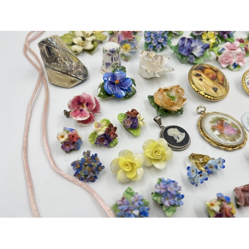 2018 - A collection of ceramic brooches and pendants to include Wedgwood black Jasperware, Aynsley Orchard ... 