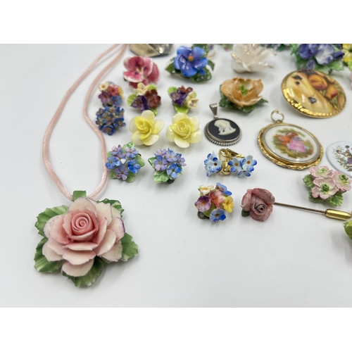 2018 - A collection of ceramic brooches and pendants to include Wedgwood black Jasperware, Aynsley Orchard ... 