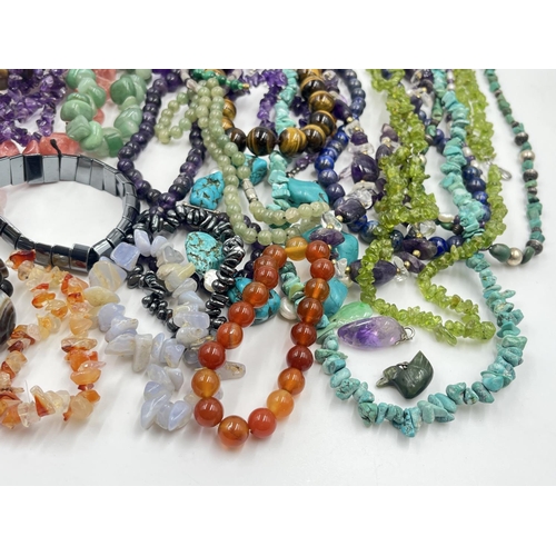 2022 - A collection of gemstone jewellery to include tiger's eye, amethyst, rose quartz etc.