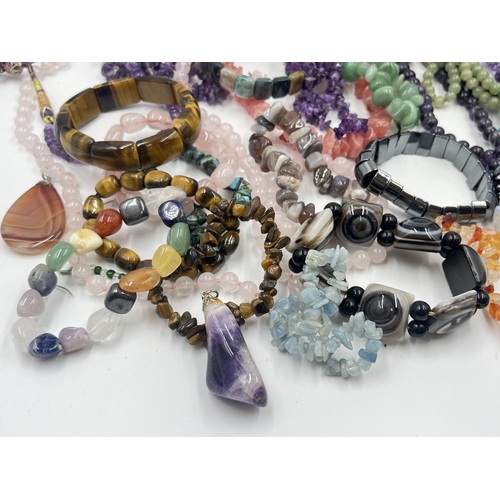 2022 - A collection of gemstone jewellery to include tiger's eye, amethyst, rose quartz etc.