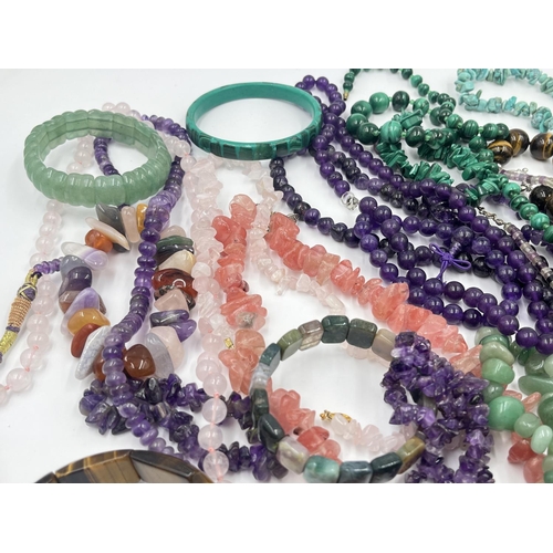 2022 - A collection of gemstone jewellery to include tiger's eye, amethyst, rose quartz etc.